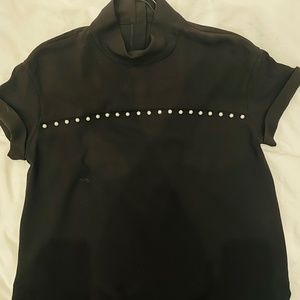 Black shirt with pearls